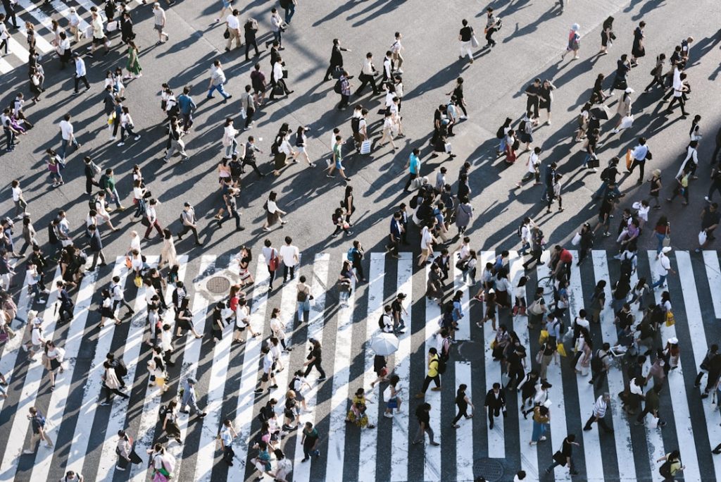 aerial-view-of-people-walking-on-raod-ibavuzsjjto about 3000 people across the shibuya crossing at a time
they look like army of ants from this point